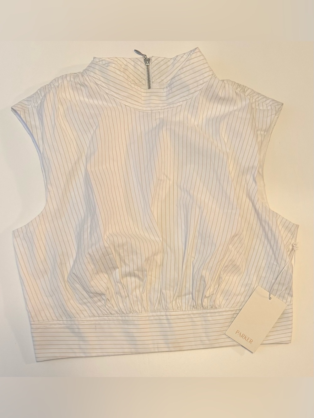 Parker White Sleeveless Top with Thin Blue Pinstripes and Mock Neck Zip